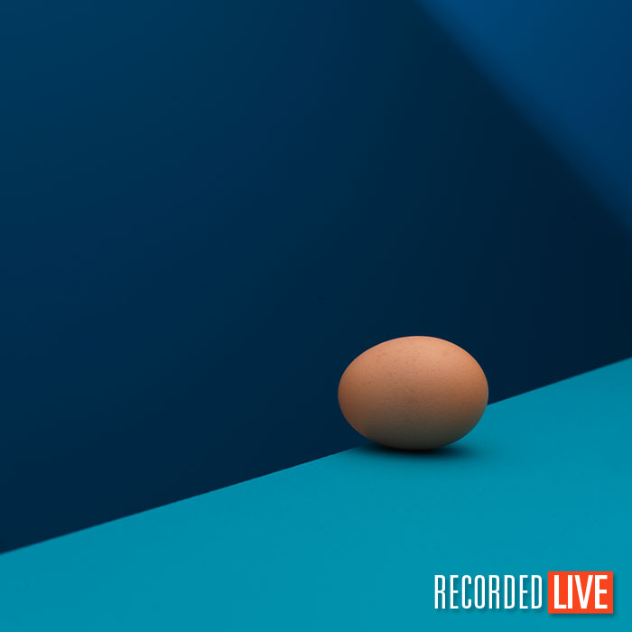 Egg photographed on blue background