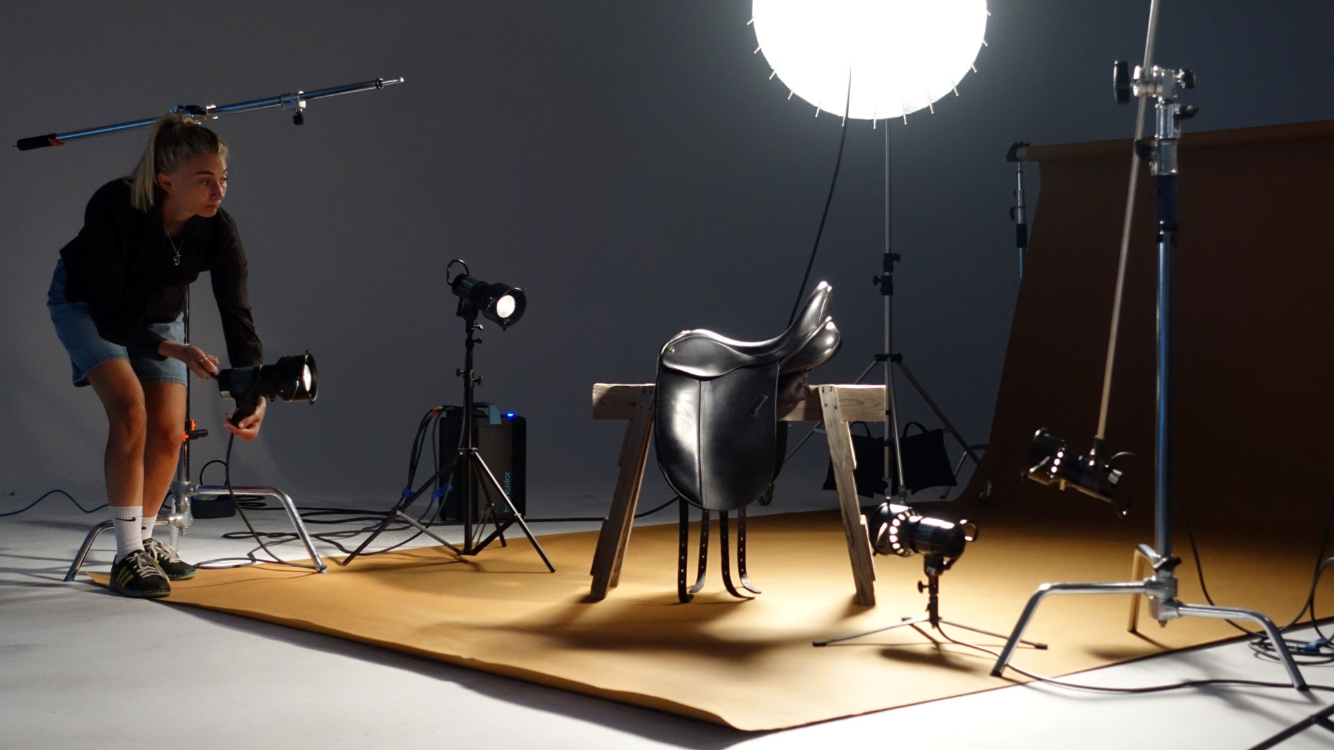 Product photography lighting setup for a saddle shoot